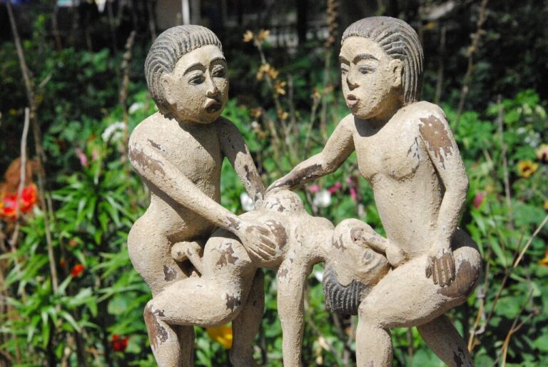 ancient Kamasutra threesome statue