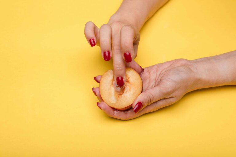 Women masturbation description using a fruit and fingers.